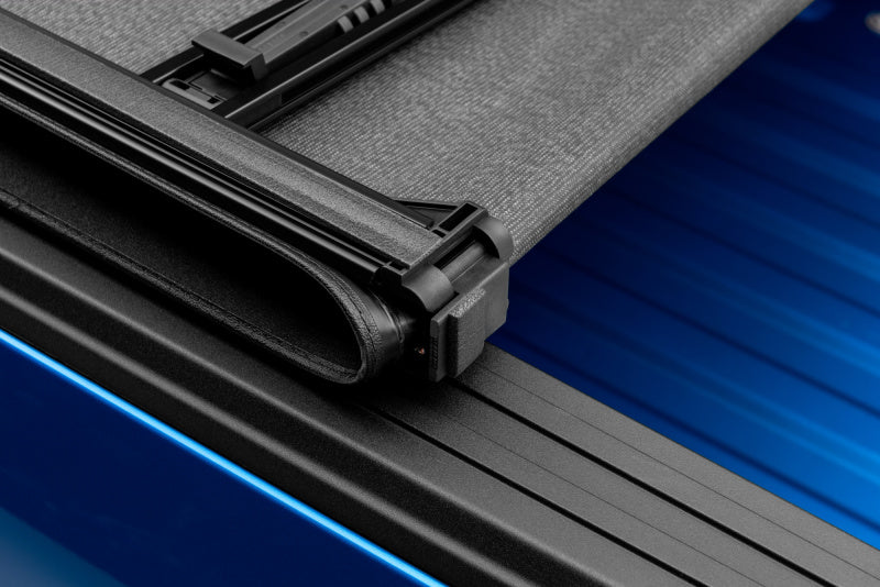 Lund 02-17 Dodge Ram 1500 (5.5ft. Bed) Genesis Elite Tri-Fold Tonneau Cover - Black 95865 95865 Photo - Close Up