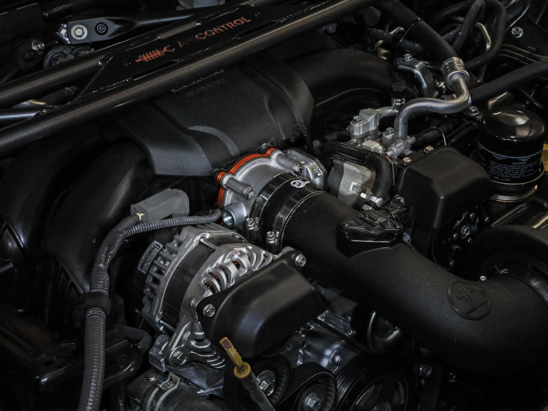 aFe Silver Bullet Throttle Body Spacers TBS 22-23 Toyota GR86 H4-2.4L - Orange 46-38013 46-38013 Photo - Mounted