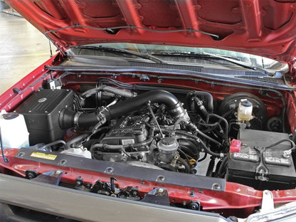 aFe Magnum FORCE Stage-2 Si Pro DRY S Cold Air Intake System: Toyota Tacom 51-82722 Photo - Mounted