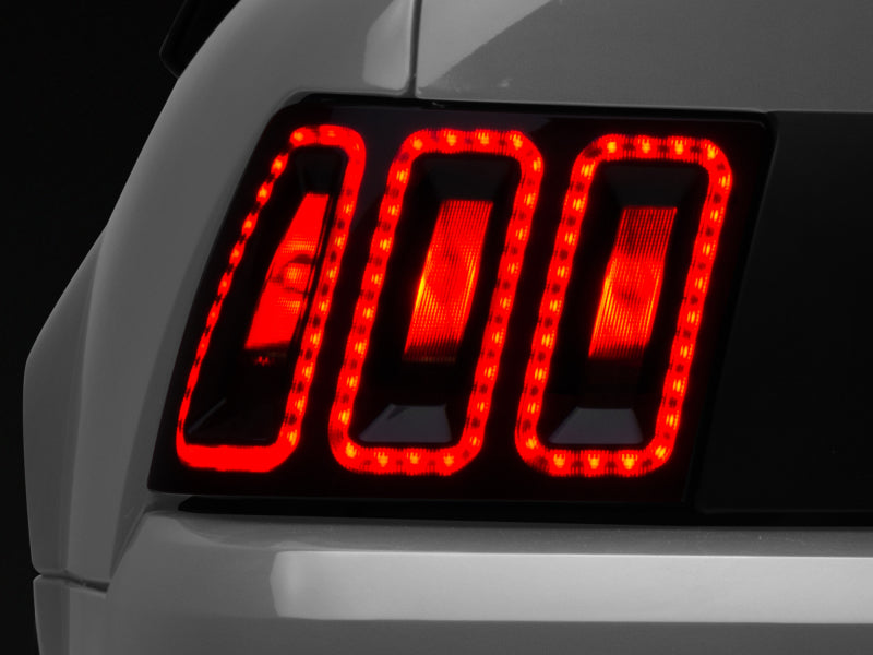 Raxiom 99-04 Ford Mustang Excluding 99-01 Cobra Icon LED Tail Lights- Black Housing (Smoked Lens) 100807 100807 Photo - Primary
