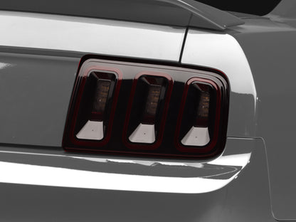 Raxiom 05-09 Ford Mustang Gen5 Tail Lights- Black Housing (Smoked Lens) 49169 49169 Photo - Close Up