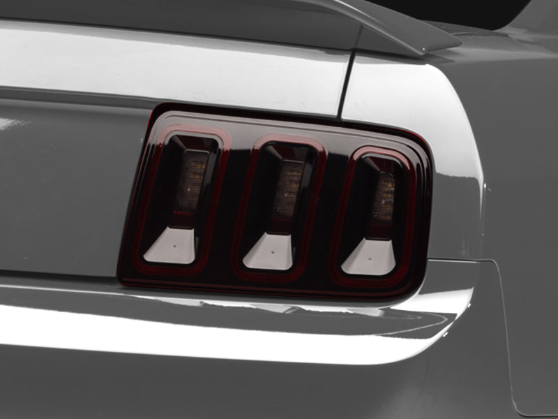 Raxiom 05-09 Ford Mustang Gen5 Tail Lights- Black Housing (Smoked Lens) 49169 49169 Photo - Close Up