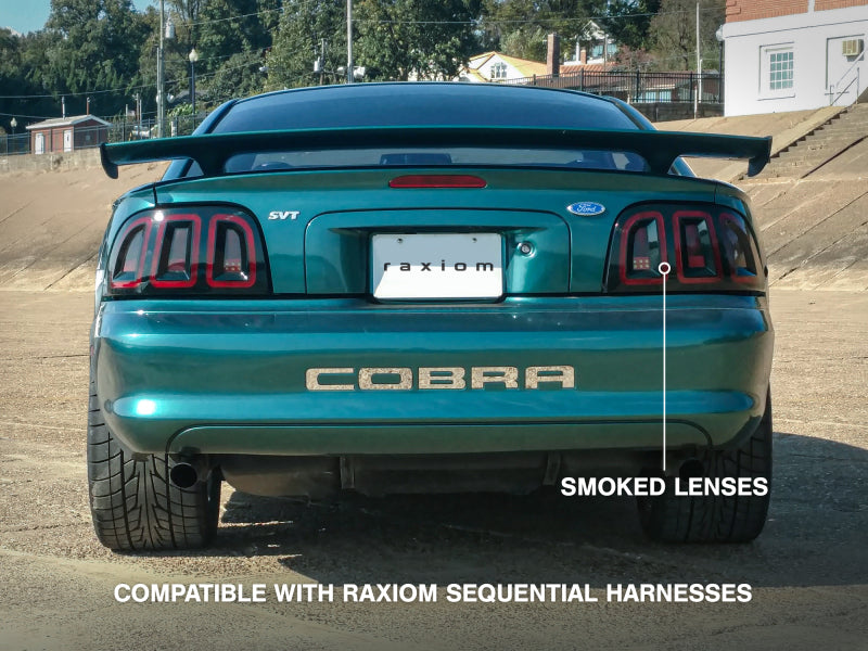 Raxiom 96-98 Ford Mustang Icon LED Tail Lights- Black Housing (Smoked Lens) 389876 389876 Photo - Close Up