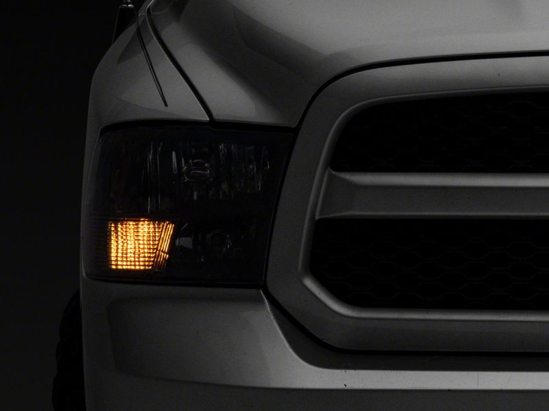 Raxiom 09-18 Dodge RAM 1500 Axial Series Euro Style Headlights w/ Dual Bulb Blk Housing (Clear Lens) R118016 R118016 Photo - Close Up