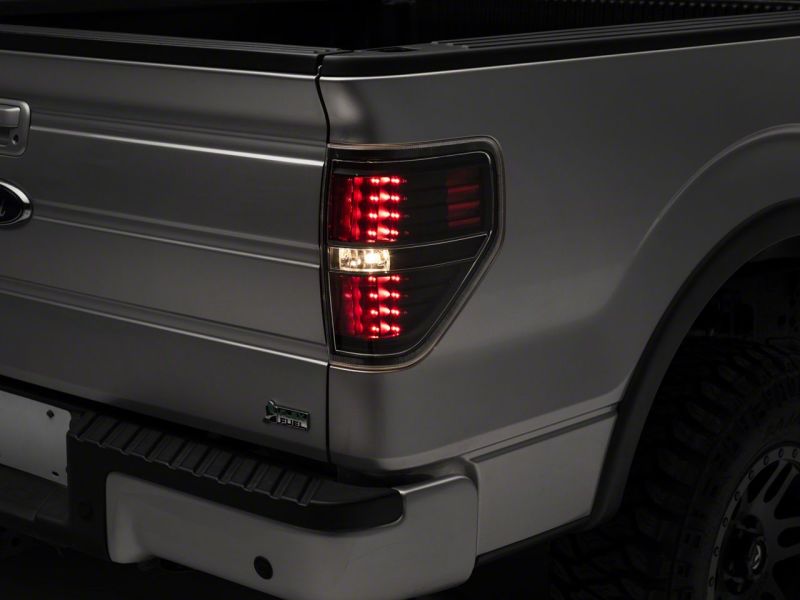 Raxiom 09-14 Ford F-150 Styleside LED Tail Lights- Blk Housing (Clear Lens) T542842 T542842 Photo - Close Up