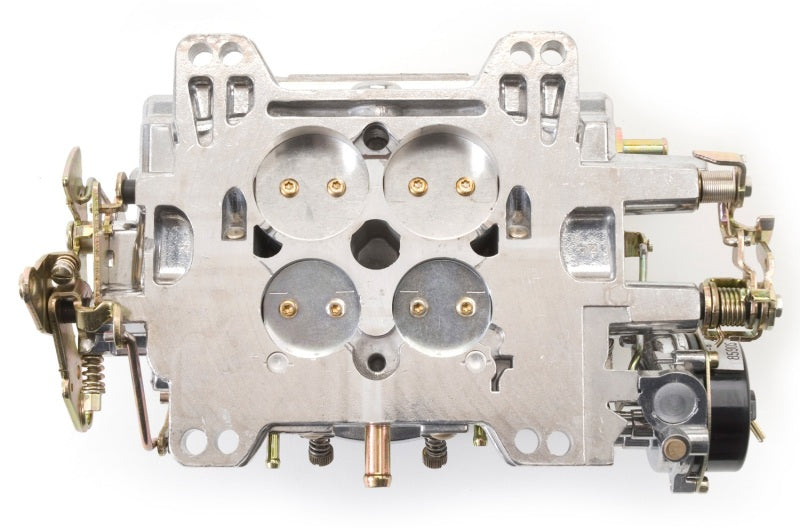 Edelbrock Reconditioned Carb #1406, 1 7/8" x 3 1/2"  Steel Collector w/ 7-8" 9906 Photo - Unmounted