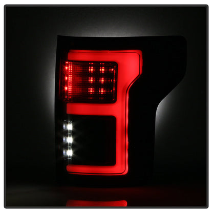 Spyder 15-18 Ford F-150 LED Tail Lights (w/Blind Spot) - Black Smoke (ALT-YD-FF15015BS-LBLED-BSM) 5085337