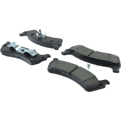 Centric Parts Disc Brake Pad Set Posi Quiet Extended Wear with Shims and Hardware for 2001-2005 Ford Explorer Sport Trac Jeep Grand Cherokee Grand Wagoneer 106.06250