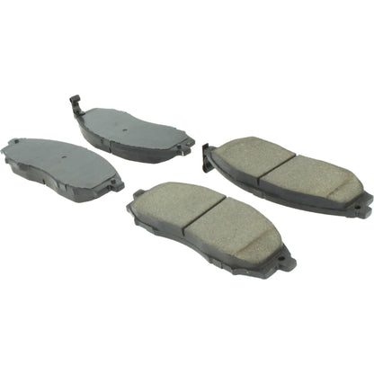 Centric Parts Disc Brake Pad Set Posi Quiet Extended Wear with Shims and Hardware for 2000-2004 Nissan Frontier Xterra 106.08300