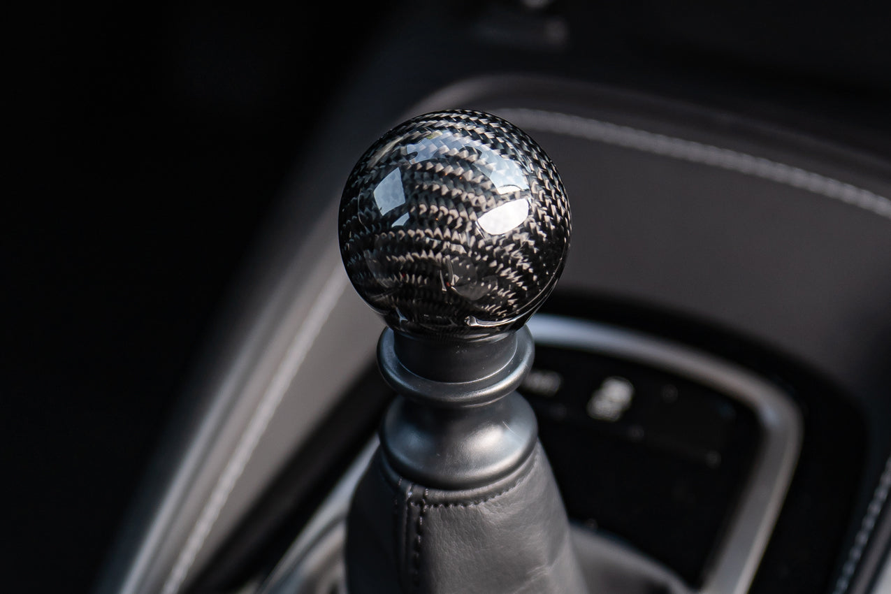 TOM'S Racing Carbon Fiber Shifter Knob - Toyota Corolla Hatchback / GR Corolla / GR Yaris