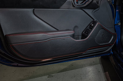 TOM'S Racing Door Kick Panel Protector - 2022+ Toyota GR86 / Subaru BRZ