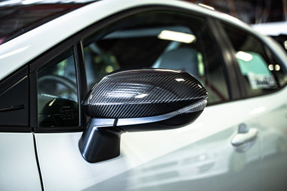 TOM'S Racing Carbon Fiber Mirror Covers - Toyota GR Corolla [2023+] / Toyota Corolla Hatchback [2019+]