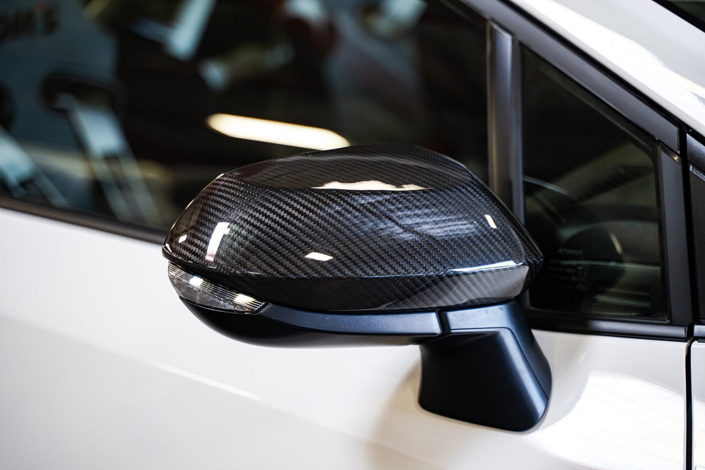 TOM'S Racing Carbon Fiber Mirror Covers - Toyota GR Corolla [2023+] / Toyota Corolla Hatchback [2019+]