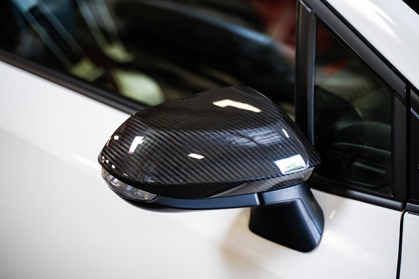 TOM'S Racing Carbon Fiber Mirror Covers - Toyota GR Corolla [2023+] / Toyota Corolla Hatchback [2019+]