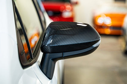 TOM'S Racing Carbon Fiber Mirror Covers - Toyota GR Corolla [2023+] / Toyota Corolla Hatchback [2019+]