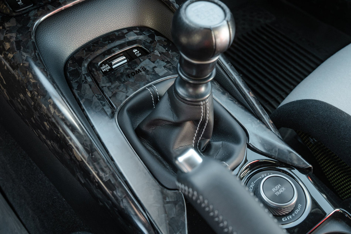 TOM'S Racing Forged Carbon Shift Panel No.01 - Toyota GR Corolla [2023+] / Toyota Corolla Hatchback [2019+]