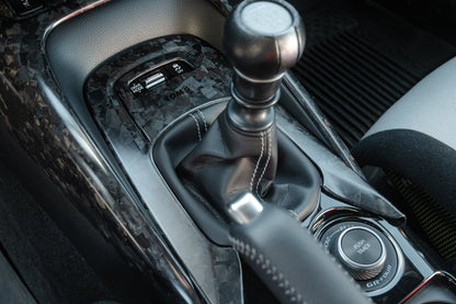 TOM'S Racing Forged Carbon Shift Panel No.01 - Toyota GR Corolla [2023+] / Toyota Corolla Hatchback [2019+]
