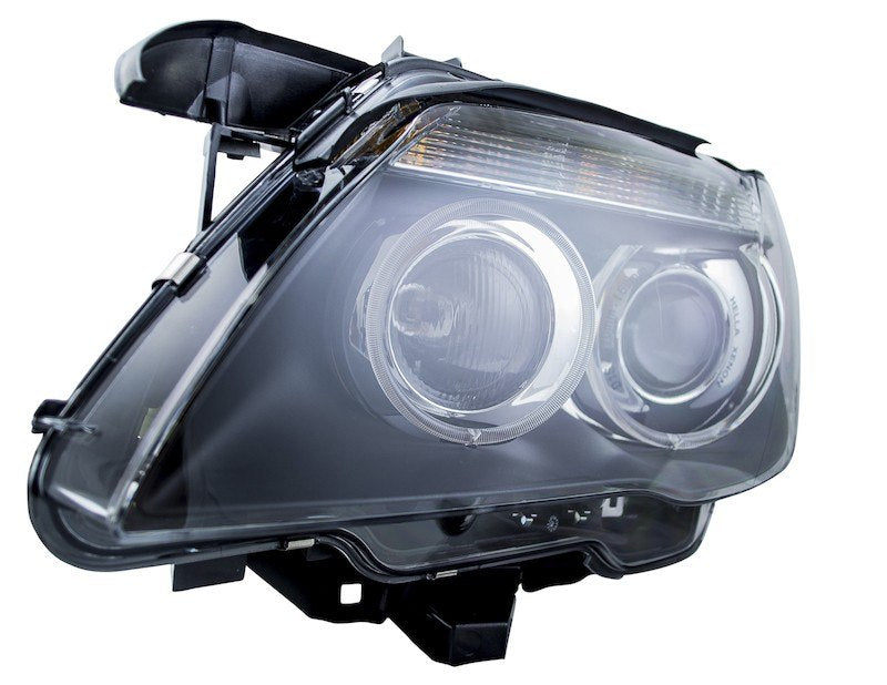 Hella 02-07 BMW 7 Series Bi-Xenon Headlight Left Clear Turn Signal 009044531
