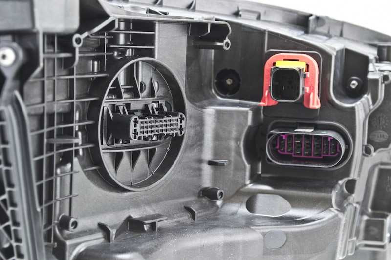 Hella Headlight Assembly 011869351