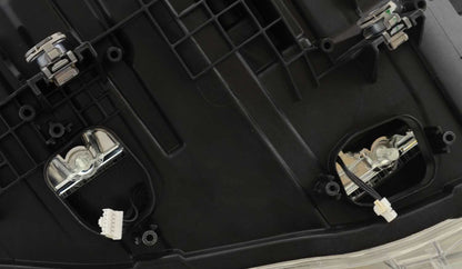 Hella Headlight Assembly 012103951