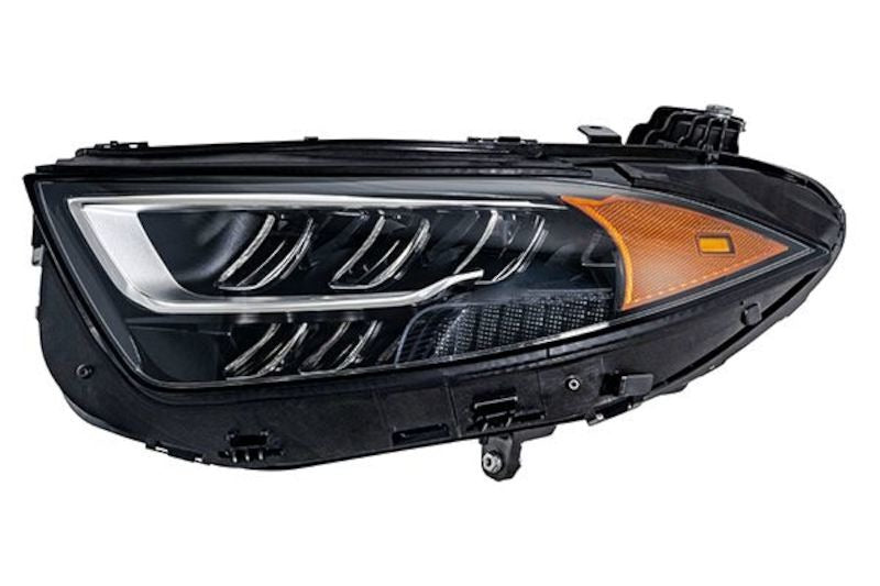 Hella Headlight 015619851