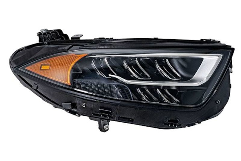 Hella Headlight 015619861