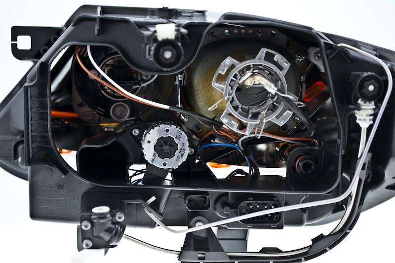 Hella 2003-2009 BMW Z4 Bi-Xenon Headlight Assembly 247001561