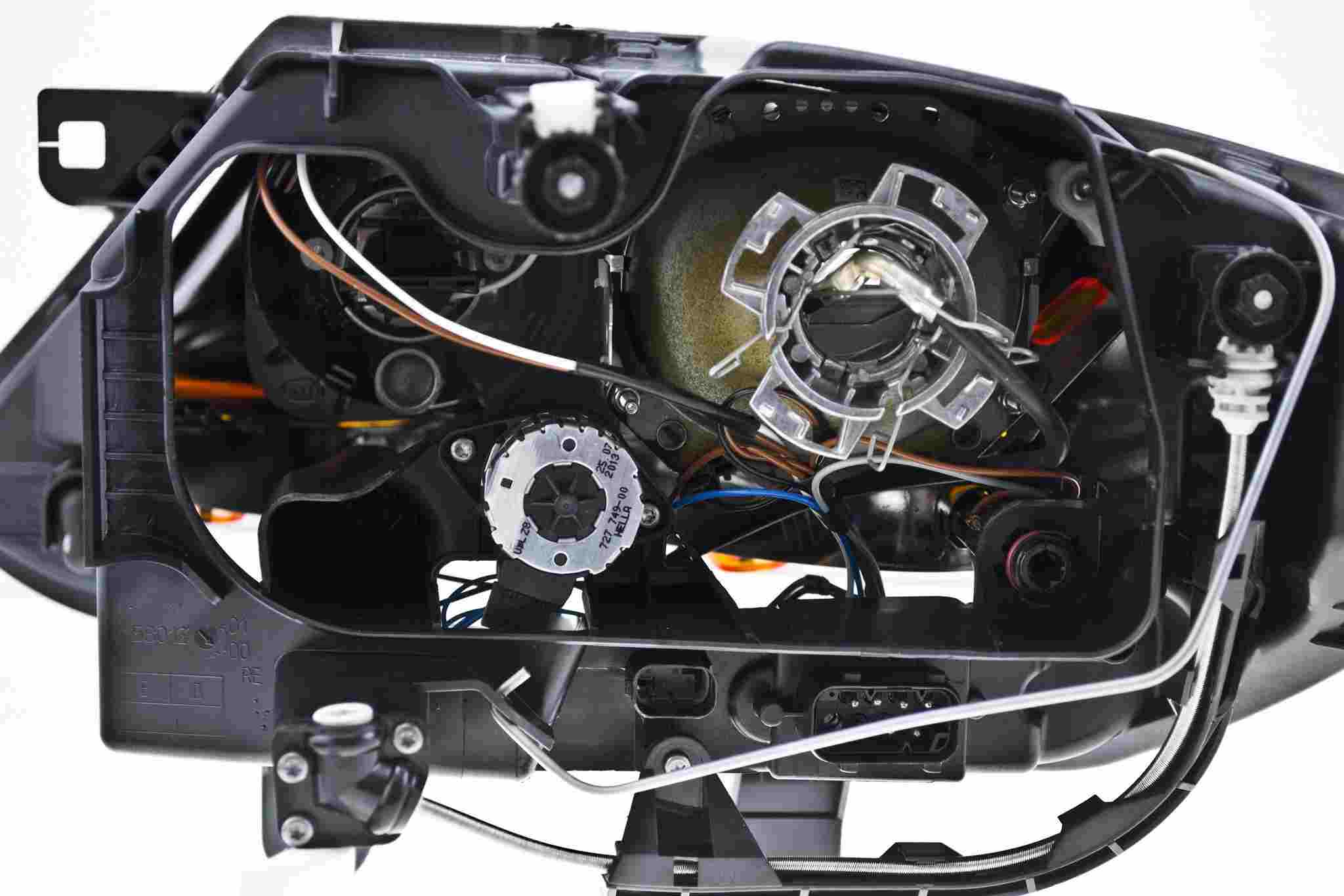Hella 2003-2009 BMW Z4 Bi-Xenon Headlight Assembly 247001561
