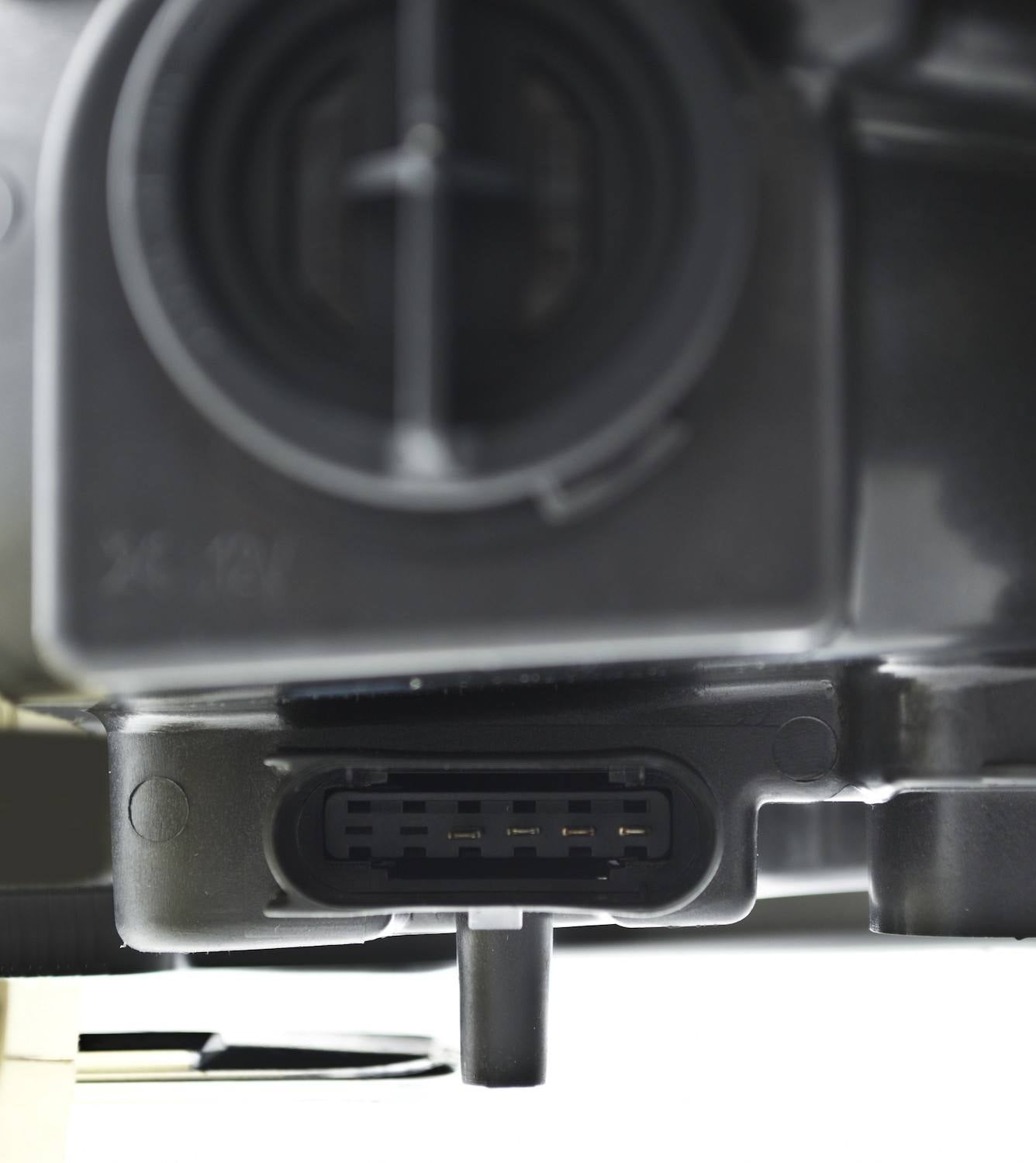 Hella Headlight Assembly 263400851