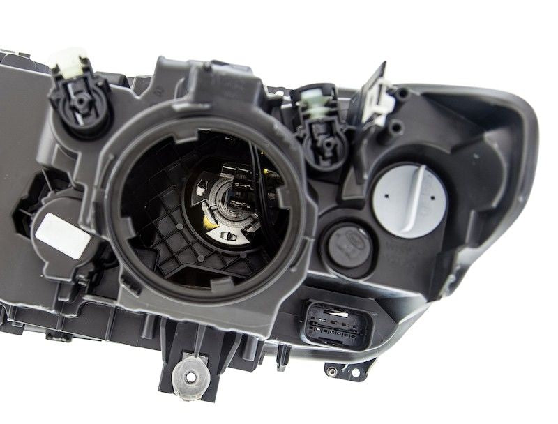 Hella Headlight Assembly 354983051