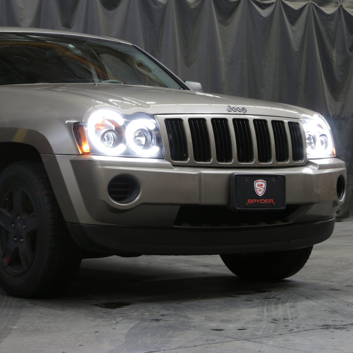Spyder 05-07 Jeep Grand Cherokee - Light Bar Projector Headlights - Black - PRO-YD-JGC05V2-LB-BK 5086129