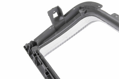 URO Headlight Door Bezel 1298260459