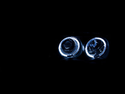 Anzo 1999-2006 Gmc Sierra 1500 Projector Headlights w/ Halo Black 111192 Photo - Mounted
