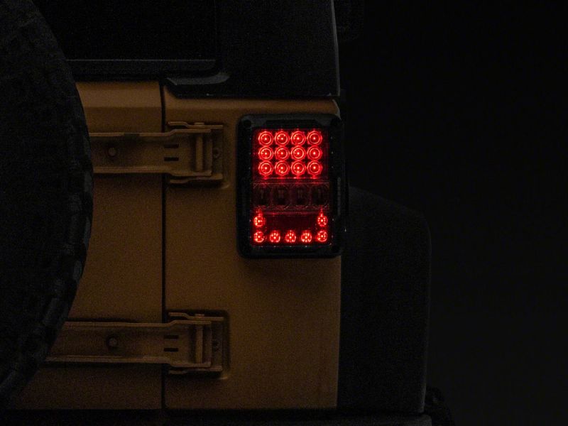 Raxiom 07-18 Jeep Wrangler JK Axial Series Lux LED Tail Lights- Blk Housing (Clear Lens) J141596 J141596 Photo - Close Up