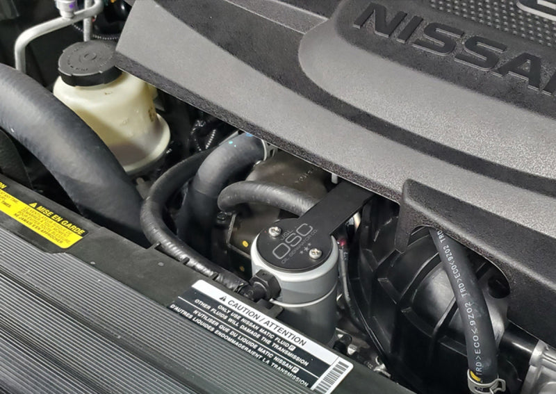 J&L 16-22 Nissan Titan 5.6L Passenger Side Oil Separator 3.0 - Clear Anodized 3108P-C 3108P-C Photo - Mounted