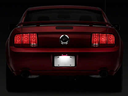 Raxiom 05-09 Ford Mustang Axial Series LED License Plate Lamps 413032 413032 Photo - Close Up
