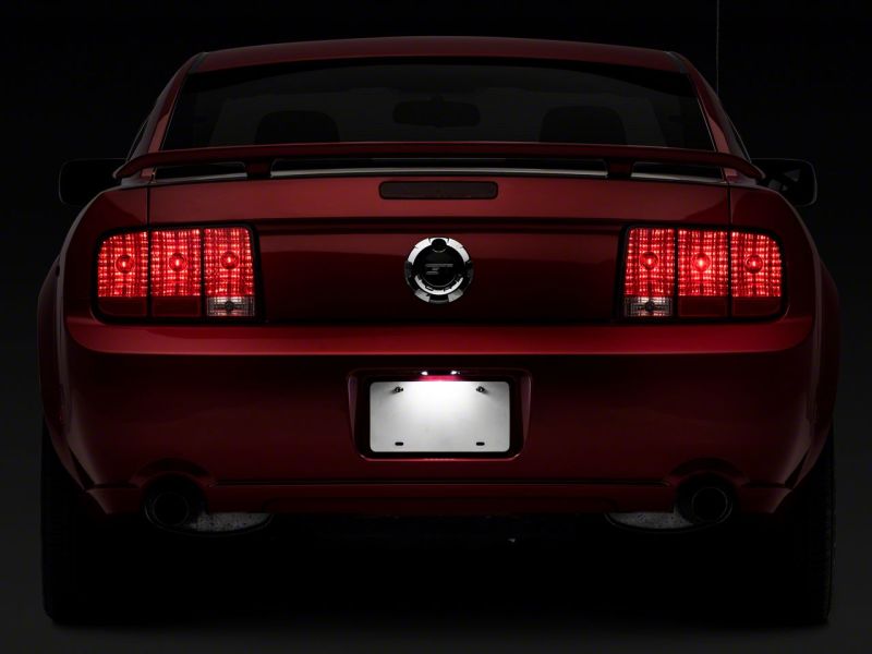 Raxiom 05-09 Ford Mustang Axial Series LED License Plate Lamps 413032 413032 Photo - Close Up