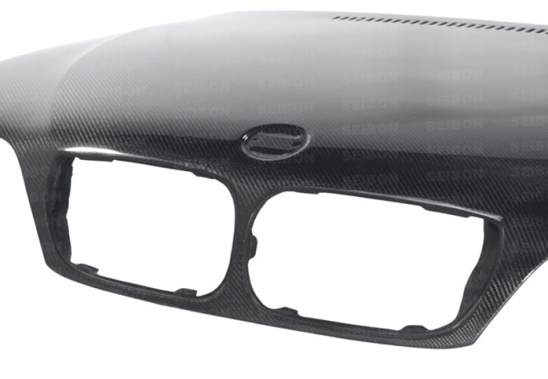 Seibon 02-05 BMW 3 Series 4dr E46 (Manuf Date 7/02-7/06 Models Only) OEM-Style Carbon Fiber Hood HD0205BMWE464D-OE HD0205BMWE464D-OE Photo - Primary