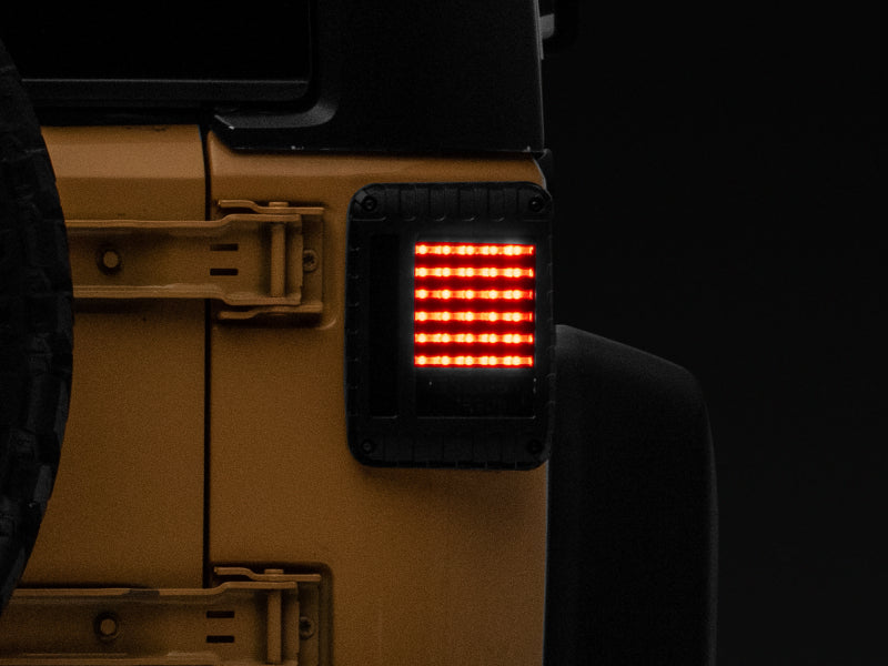 Raxiom 07-18 Jeep Wrangler JK LED Tail Lights- Black Housing (Smoked Lens) J115435 J115435 Photo - Close Up