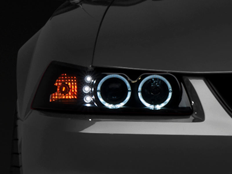 Raxiom 99-04 Ford Mustang Dual LED Halo Projector Headlights- Black Housing (Smoked Lens) 49113 49113 Photo - Close Up