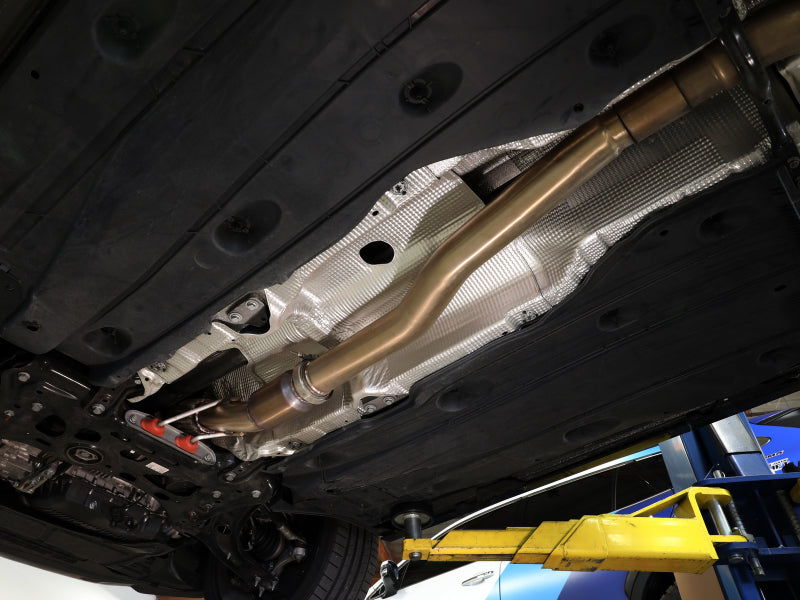 aFe Power Twisted Steel Down Pipe 3in 304 Stainless Steel w/ Cat 15-18 VW Golf R MKVII L4-2.0L (t) 48-36411-1YC 48-36411-1YC Photo - Mounted