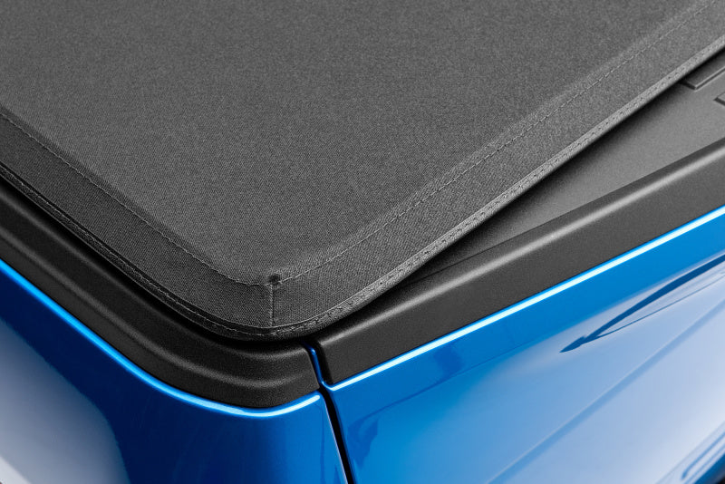 Lund 02-17 Dodge Ram 1500 (5.5ft. Bed) Genesis Elite Tri-Fold Tonneau Cover - Black 95865 95865 Photo - Close Up
