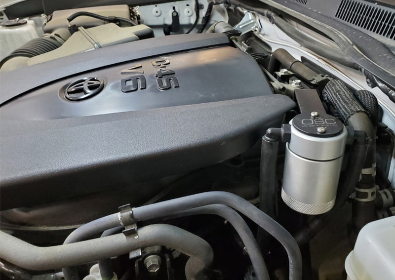J&L 16-23 Toyota Tacoma 3.5L Driver Side Oil Separator 3.0 - Clear Anodized 3104D-C 3104D-C Photo - Mounted