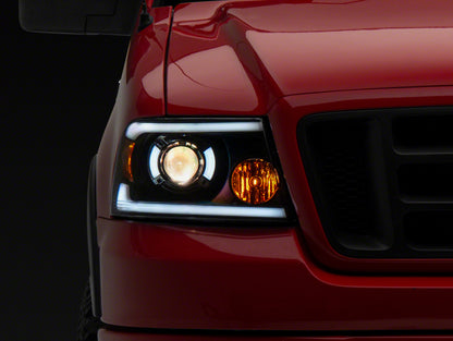 Raxiom 04-08 Ford F-150 Axial Series Projector Headlights w/ SEQL LED Bar- Blk Housing (Clear Lens) T566364 T566364 Photo - Primary