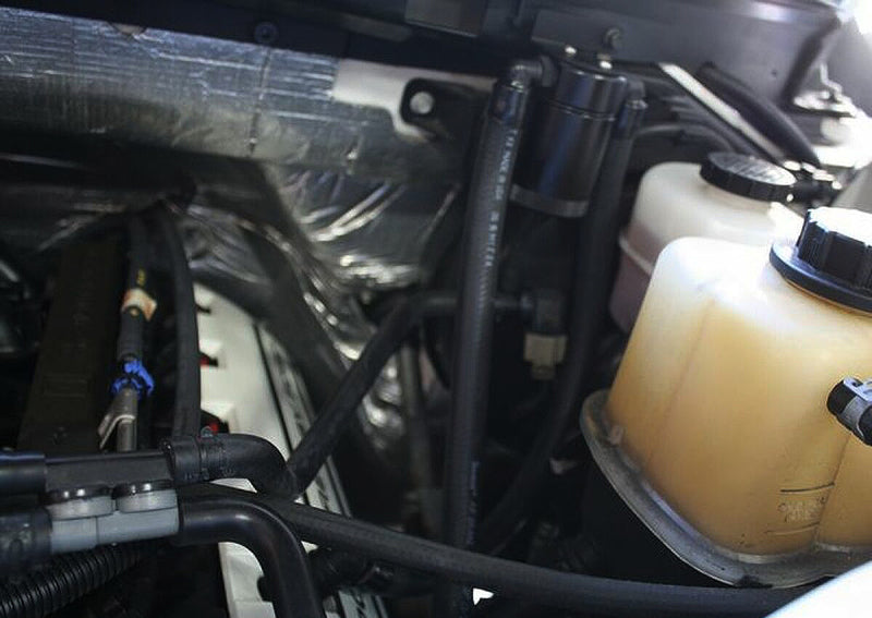 J&L 11-17 Ford F-150 5.0L / 11-14 Ford F-150 6.2L Driver Side Oil Separator 3.0- Black Anodized 3016D-B 3016D-B Photo - Mounted