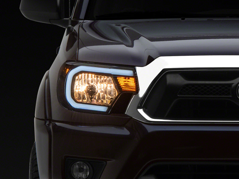 Raxiom 12-15 Toyota Tacoma Axial Series Headlights w/ LED Bar- Blk Housing (Clear Lens) TT21847 TT21847 Photo - Primary