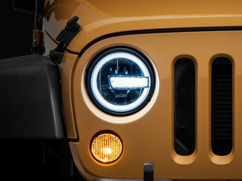 Raxiom 97-18 Jeep Wrangler TJ/JK 7-Inch LED Headlights w/ Halos- Black Housing (Clear Lens) J155018 J155018 Photo - Close Up