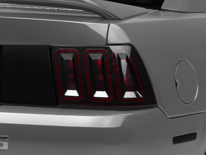 Raxiom 99-04 Ford Mustang Excluding 99-01 Cobra Icon LED Tail Lights- Black Housing (Smoked Lens) 100807 100807 Photo - Close Up