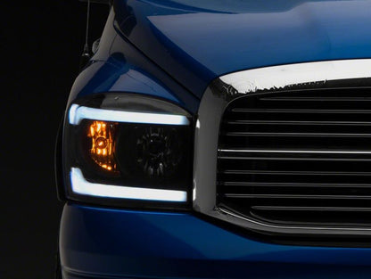 Raxiom 06-09 Dodge RAM 1500/2500/3500 Axial Headlights w/ SEQL LED Bar- Blk Housing (Clear Lens) R131480 R131480 Photo - Close Up