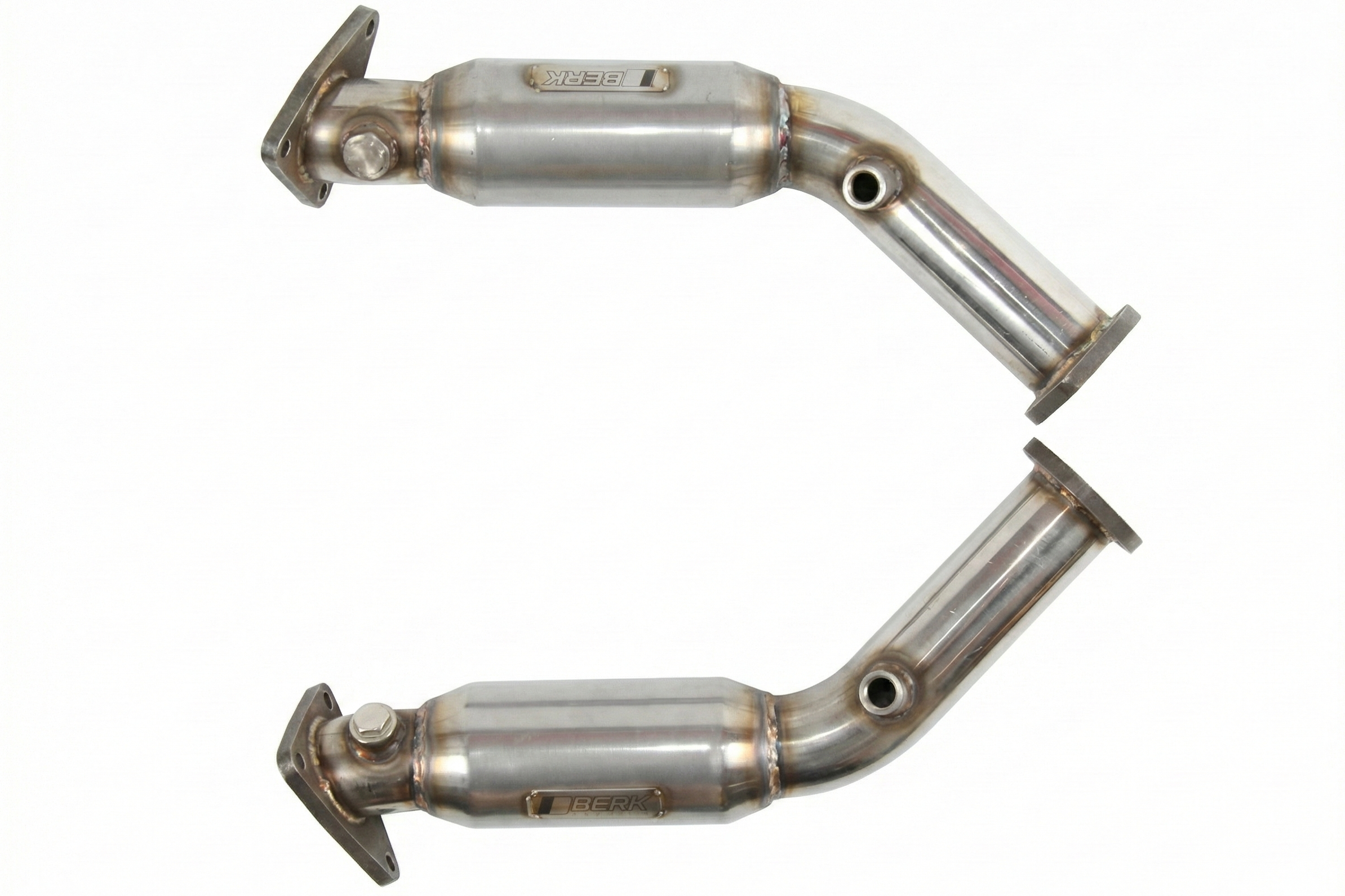 Pair of metallic exhaust pipes on a white background